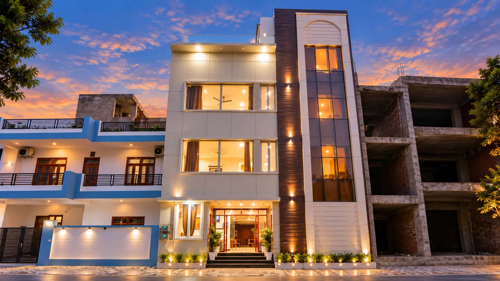 Hotel facade with warm lighting at dusk